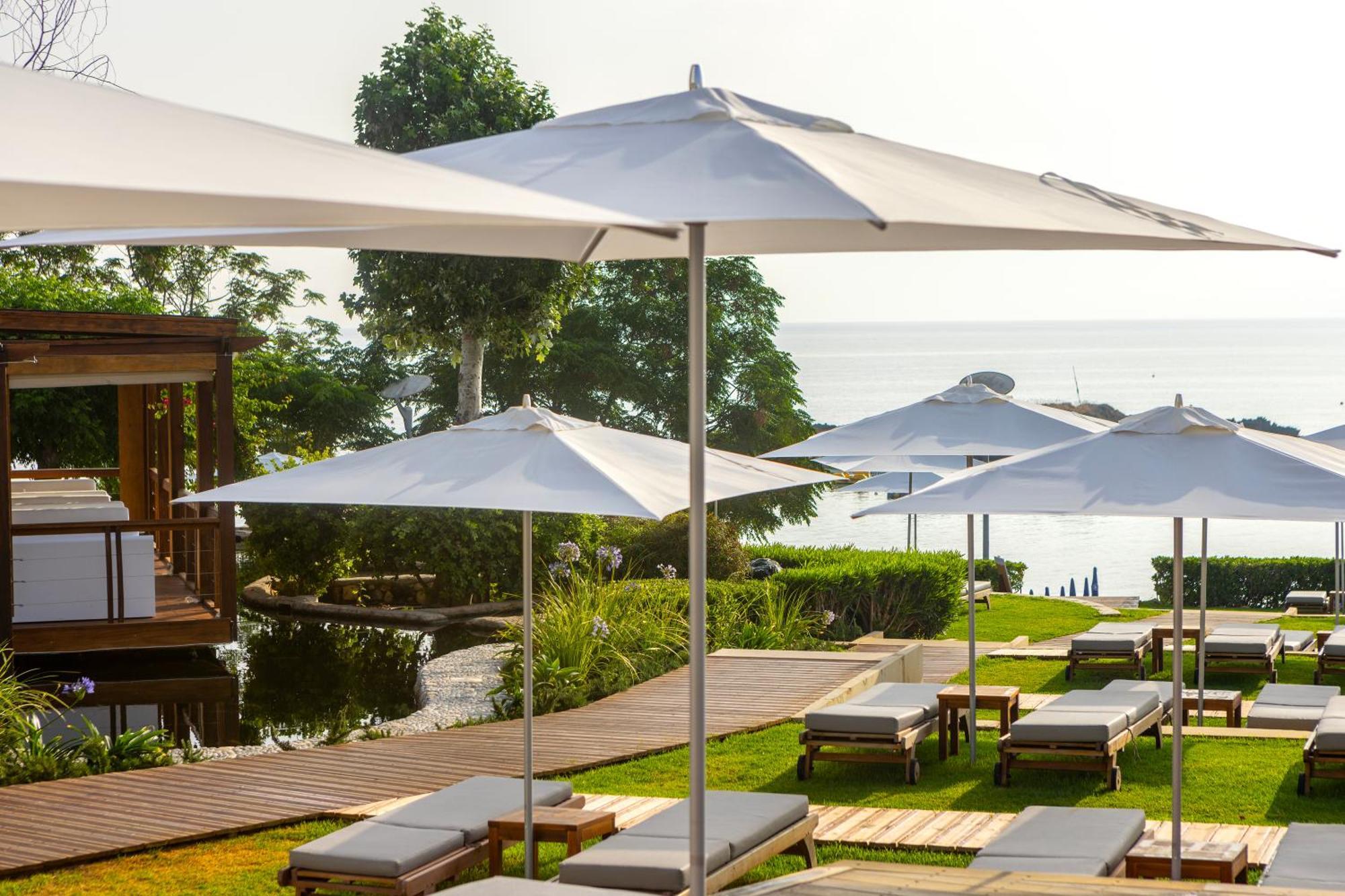Capo Bay Hotel Protaras Luaran gambar The beach at the hotel